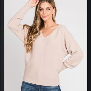 Cream colored V neck sweater